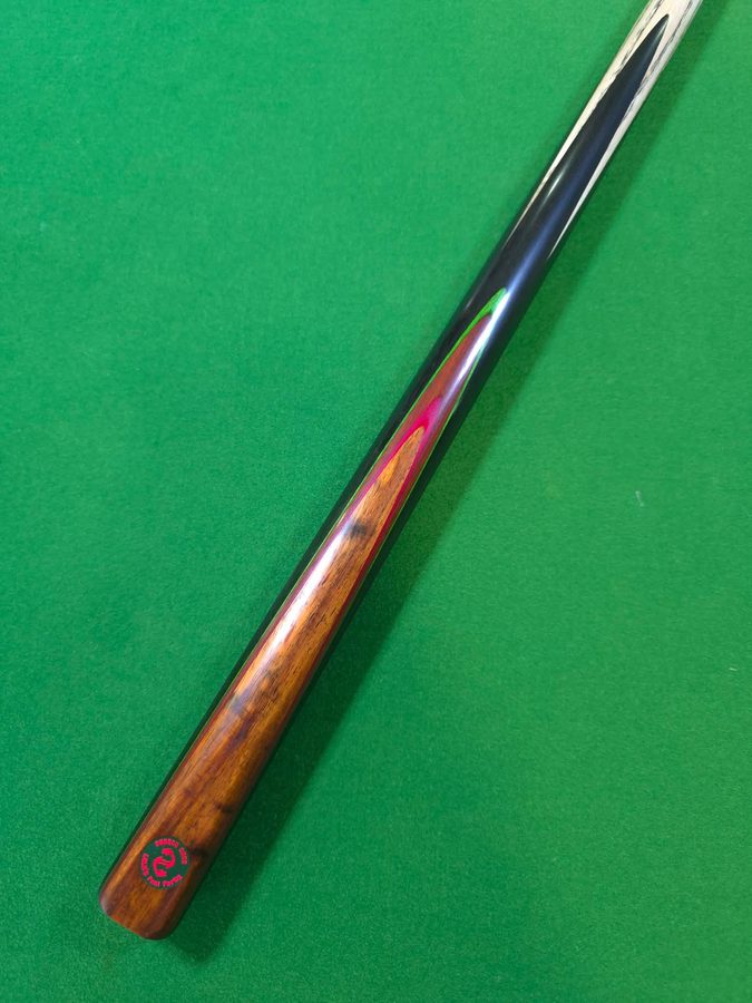 Close-up of a black, red and green splice cue